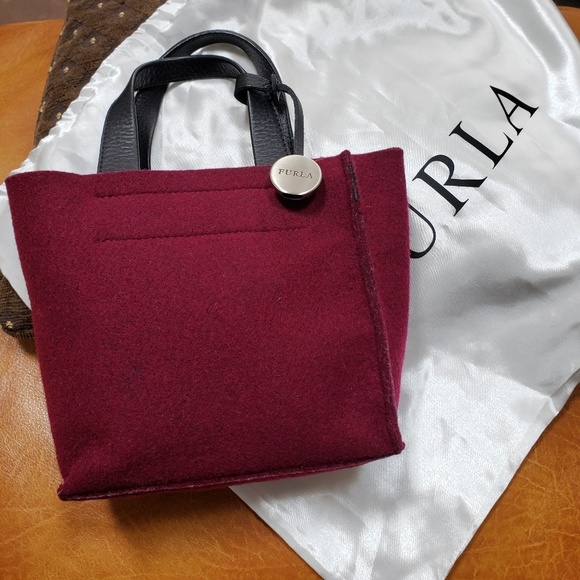 Furla Handbags - Furla burgundy wool purse